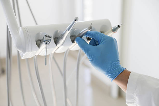 Professional Dental Implants technician working in Elwood, NY